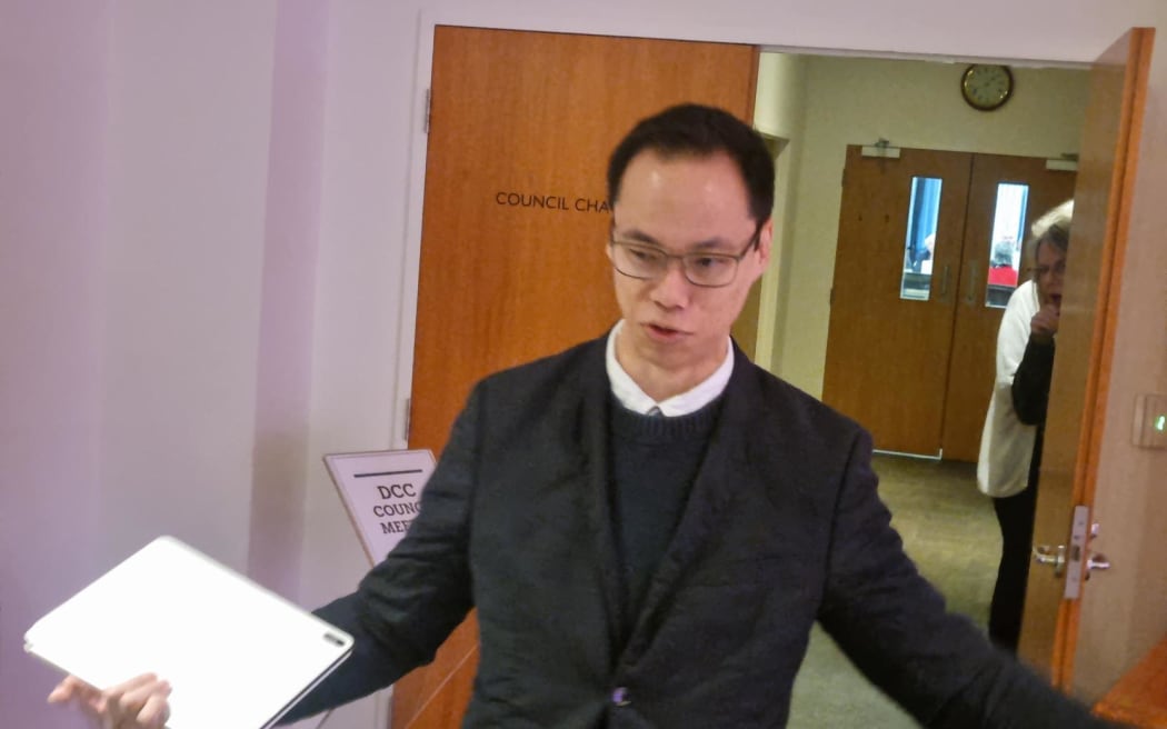 Dunedin councillor Benedict Ong says he will never resign before declining an invitation to attend a closed meeting for a code of conduct complaint against him.