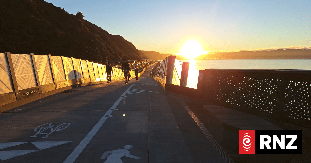 Cyclists commute at sunrise on the 'beautiful' Te Ara Tupua