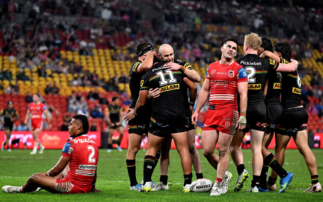 BRISBANE, AUSTRALIA - MAY 17: Isaiah Papali'i of the Panthers celebrates with team mates after scoring a try during the round 11 NRL match between Penrith Panthers and St George Illawarra Dragons at Suncorp Stadium, on May 17, 2026, in Brisbane, Australia. (Photo by Bradley Kanaris/Getty Images)
