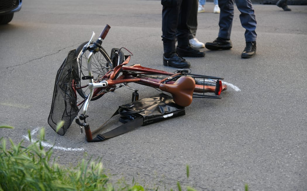 A bicycle lies mangled in the street in Modena after the car-ramming incident.
Mandatory Credit:	LaPresse/Shutterstock via CNN Newsource
