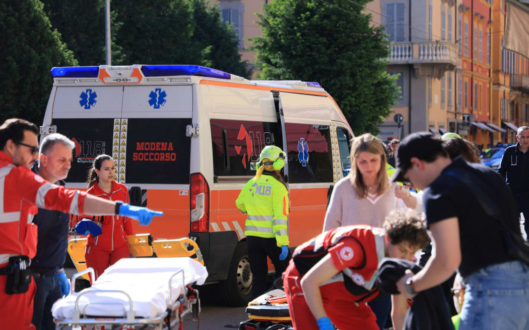 Emergency personnel prepare a gurney after a vehicle struck several pedestrians in downtown Modena on Saturday, May 16, 2026.
Mandatory Credit:	Giorgia Bassoli/EPA/Shutterstock via CNN Newsource