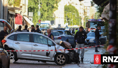 Four civilians tackle knife-wielding driver after car plows into crowd in Italy