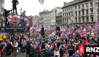 Tens of thousands turn out for UK far-right rally, counter demo