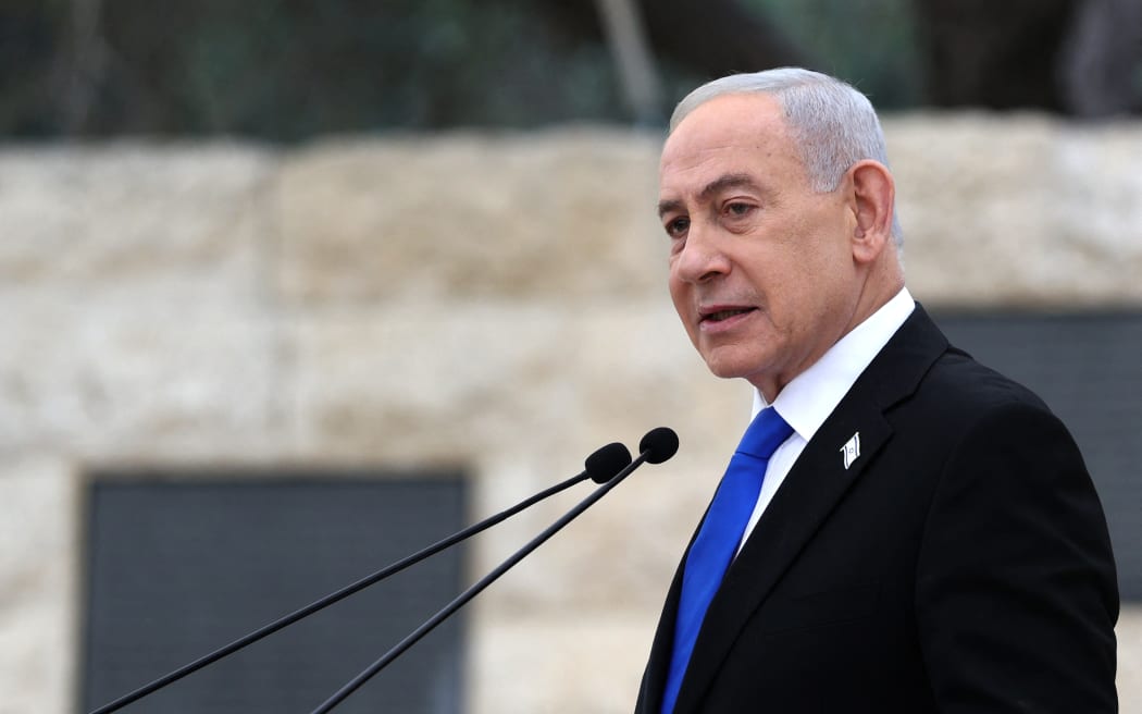 Israel’s Prime Minister Benjamin Netanyahu speaks during a ceremony commemorating Israel’s Remembrance Day for fallen soldiers, or Yom HaZikaron, at the Military Cemetery on Mount Herzl in Jerusalem on April 21, 2026.