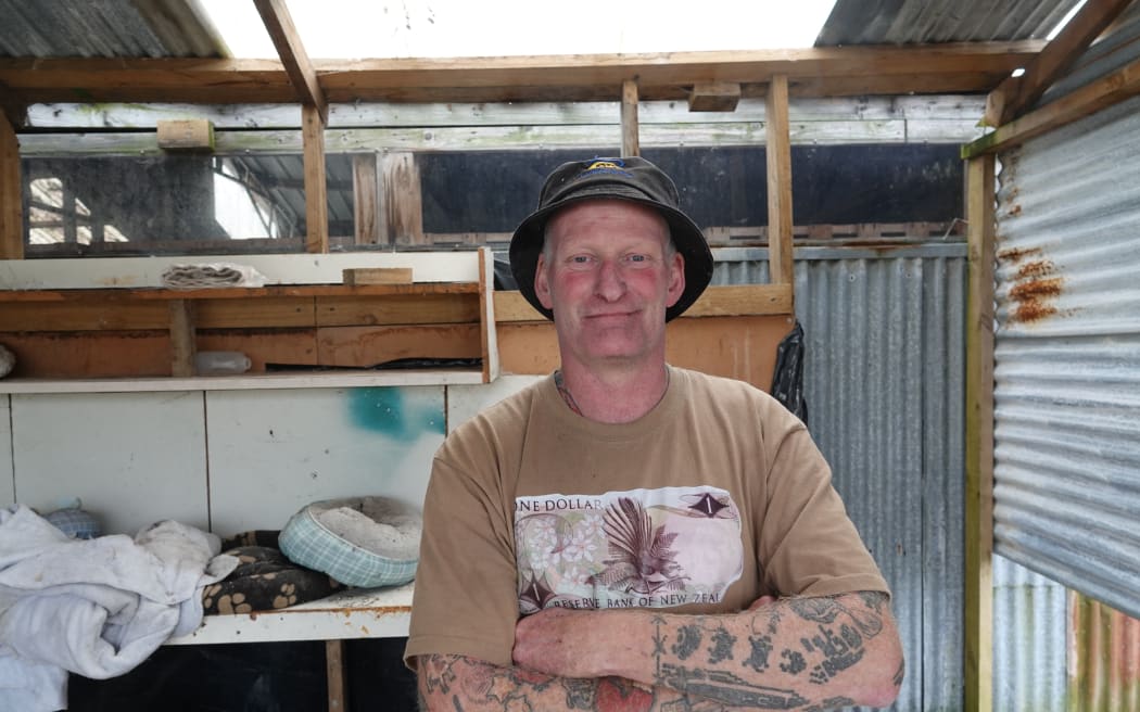 Tony Hitchcock, in his former cattery at Marton, says he's stressed that his rescue is facing opposition as it relocates.