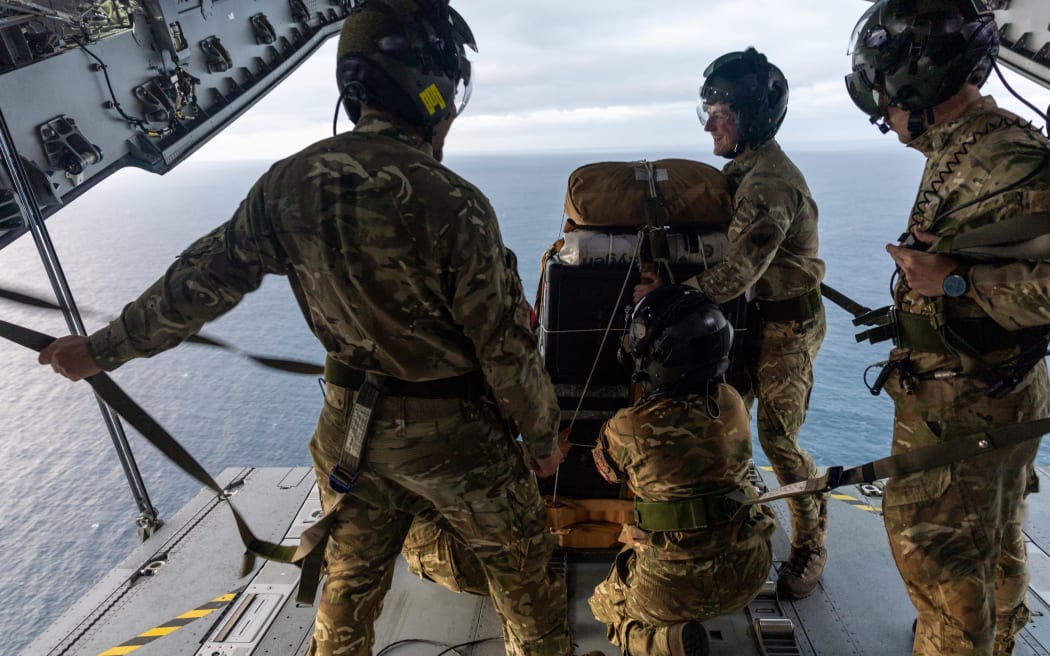 In a handout picture taken on May 9, 2026 and released by the British Ministry of Defence (MOD) on May 10, 2026, members of the RAF drop medical kit to the Atlantic Island of Tristan Da Cunha to provide assistance to a British National who contracted hantavirus aboard an Atlantic expedition cruise ship, MV Hondius. (Photo by Sarah BARSBY / MOD / AFP) / RESTRICTED TO EDITORIAL USE - MANDATORY CREDIT  