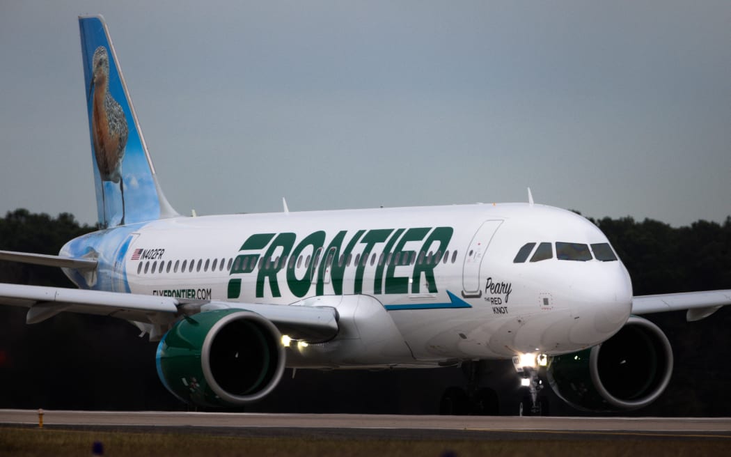 A Frontier Airlines plane departs from George Bush Intercontinental Airport (IAH) in Houston, Texas, on December 29, 2025. (Photo by Reginald Mathalone/NurPhoto) (Photo by Reginald Mathalone / NurPhoto via AFP)
