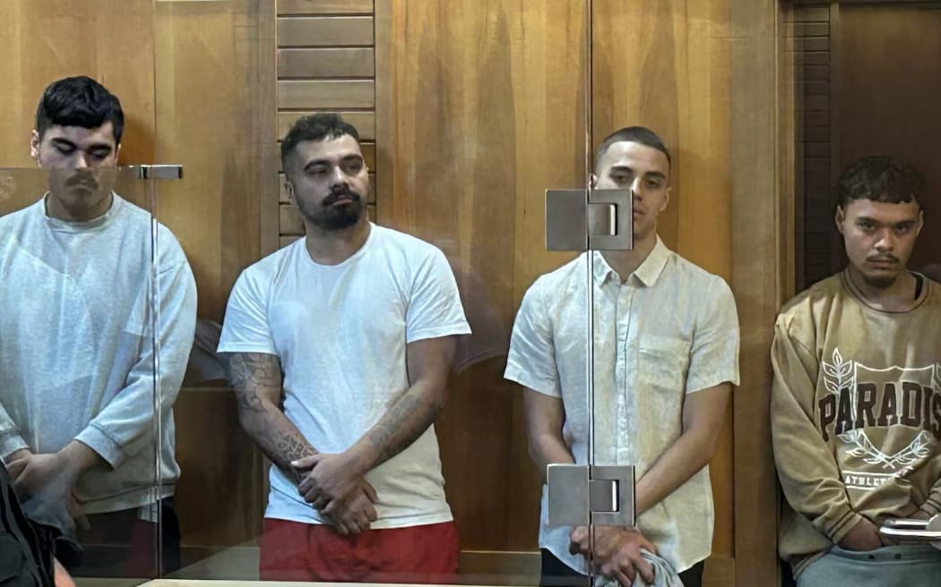 Four men charged over the death of Boy Taylor behind a glass barrier in the High Court at Napier. They are from left Trizarn Henare, Rua Hune, Tuarima Alexander, and Takarangi Kumar. Photo / Ric Stevens