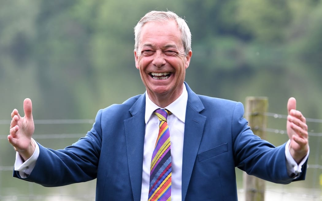 Reform UK leader Nigel Farage reacts to local elections swinging favourably to his party, in north west England on 8 Ma, 2026, as votes continue to be counted.