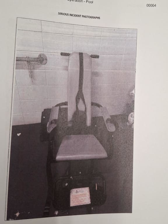 credit: restraint chair used by police, from evidence exhibits at inquest. caption: Jaye Taueli forcefully thrashed his head back and forth over 160 times while tied down in a police restraint chair, and later lost consciousness.