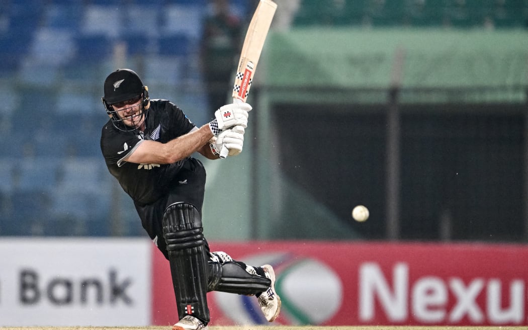 New Zealand's Dean Foxcroft plays a shot during the third one-day international (ODI) cricket match between Bangladesh and New Zealand at the Bir Sreshtho Flight Lieutenant Matiur Rahman Stadium in Chittagong on April 23, 2026. (Photo by MUNIR UZ ZAMAN / AFP)