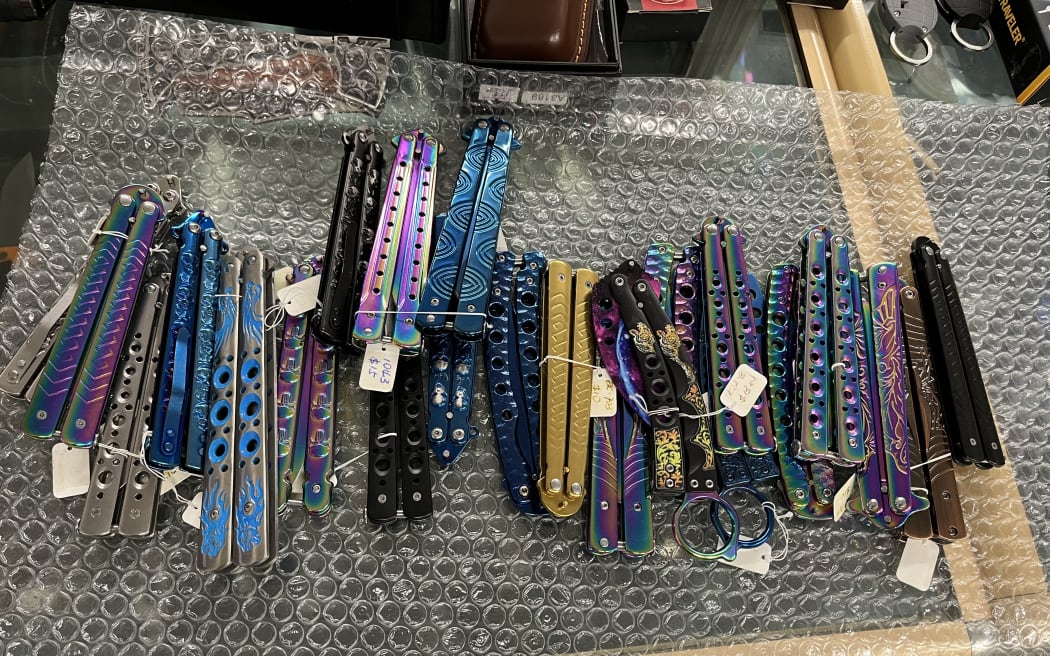 Investigators searching the couple's home in June 2025 found large numbers of flick knives (pictured), butterfly knives, and throwing knives.