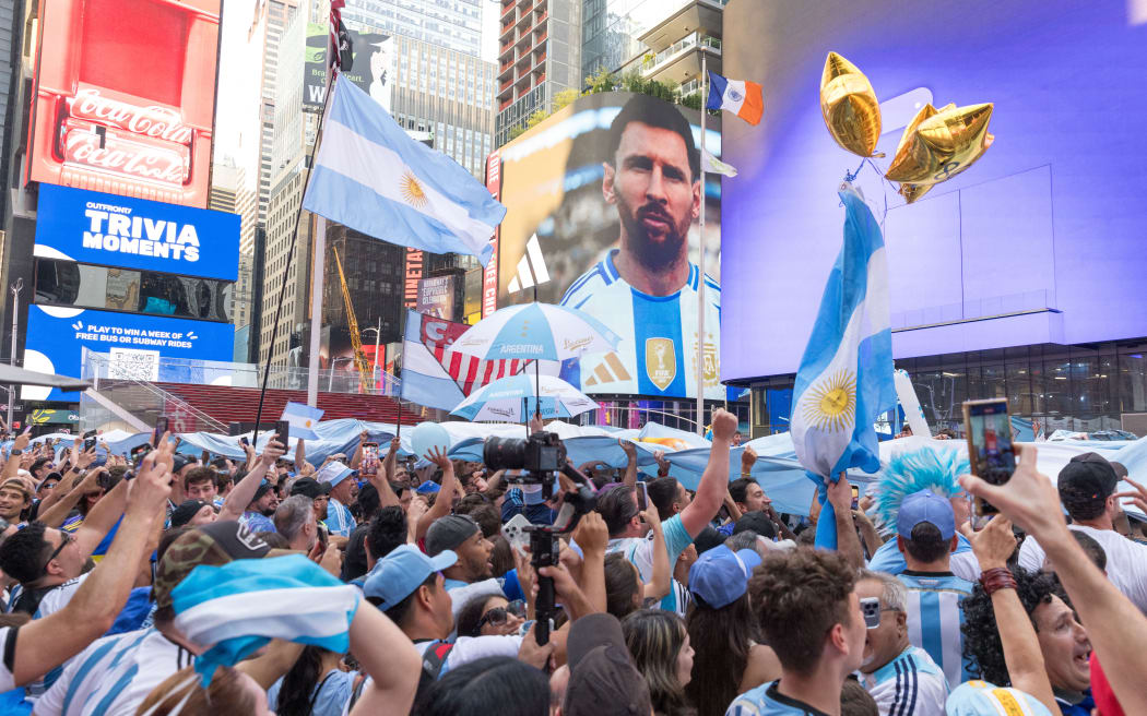 Argentina's supporters cheer as they gather at Times Square, New York City, on July 8, 2024, on the eve of the Conmebol Copa America 2024 tournament semi-final football match between Argentina and Canada. (Photo by VANESSA CARVALHO/BPP / Brazil Photo Press via AFP)