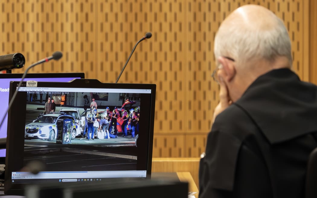 5th May 2026 Iain McGregor/The PressJustice Cameron Mander watches footage of the incident played on the court tv screens.Murder trial for Hayden Donald Jason Tasker. He has pleaded not guilty of murdering Senior Sergeant Lyn Fleming in Nelson early on January 1 and intentionally causing grievous bodily harm to Senior Sergeant Adam Ramsay. They were struck by a vehicle while on foot patrol in central Nelson early on New YearÕs Day.
