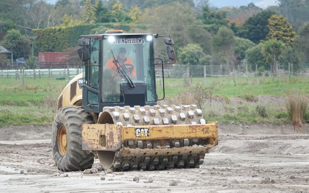 One of the sediment reduction ponds is under construction.
