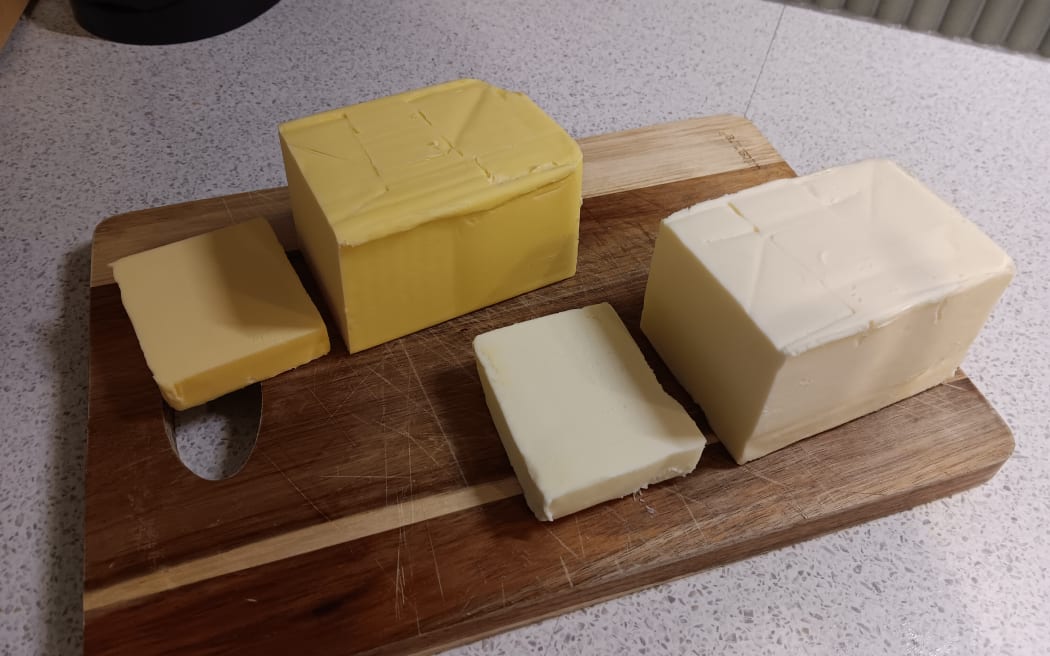 The yellow colour of butter that comes from grass fed cows, versus the paler comparison of grain fed cow butter.