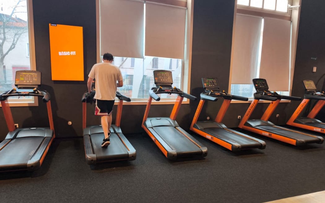 A man runs on a treadmill in a gym in France, in February 2026.