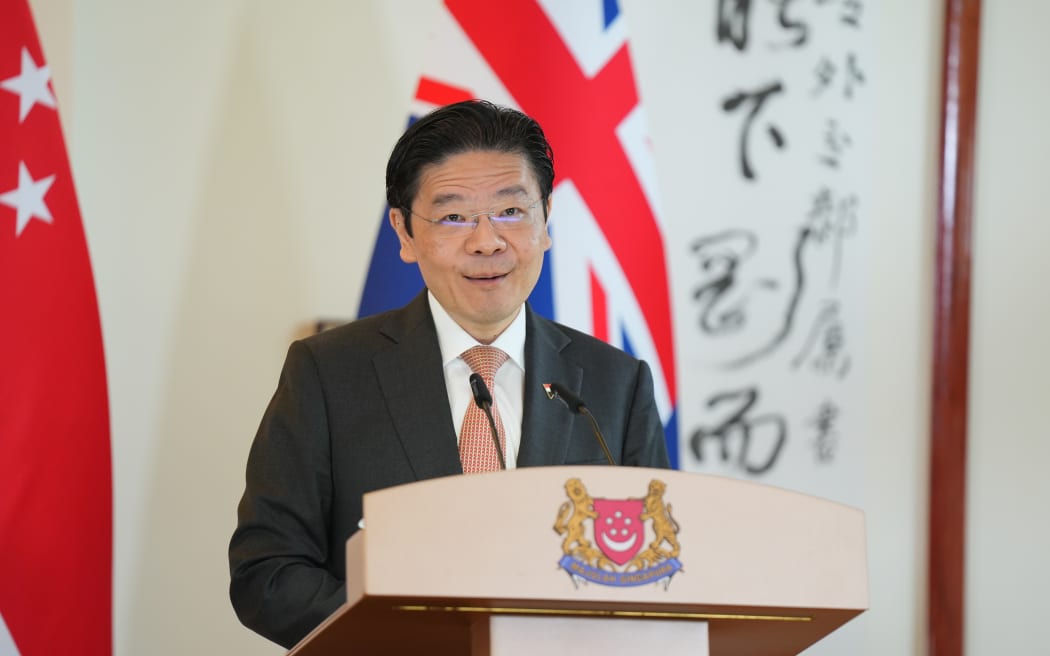 Singaporean Prime Minister Lawrence Wong at the signing of a trade deal with New Zealand.