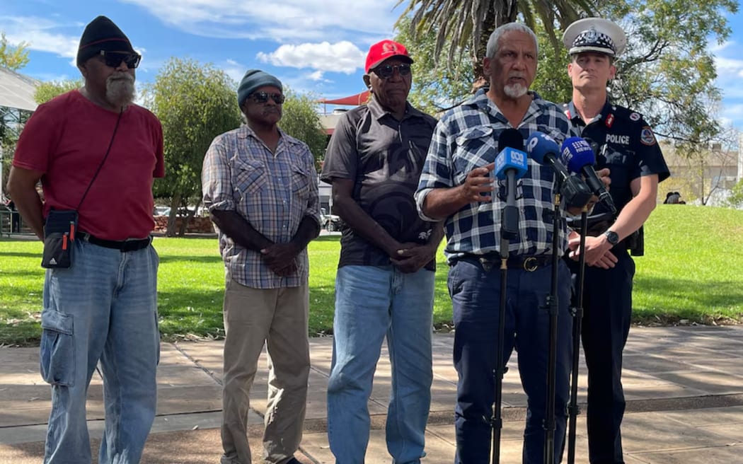 Baydon Williams, Cedric Miller, Warren Williams and Michael Liddle with NT Police regional controller James Gray-Spence on Friday. (