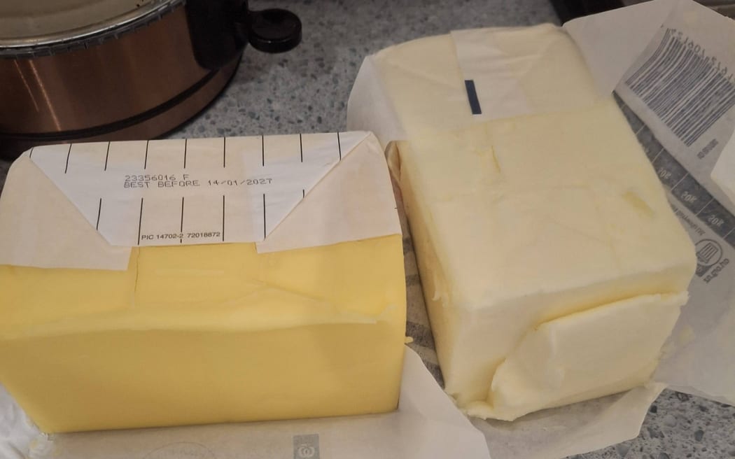 The sunny yellow block (left) is New Zealand made product, while the American butter from grain fed cows is a paler tone.