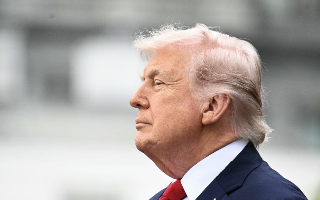 US President Donald Trump look on during an arrival ceremony on the South Lawn of the White House in Washington, DC, on April 28, 2026. (Photo by Jim WATSON / AFP)