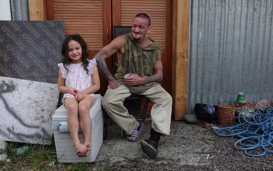 Dwayne Rawiri, with daughter Te Aomarama, 5, says moving to higher ground is the only solution.