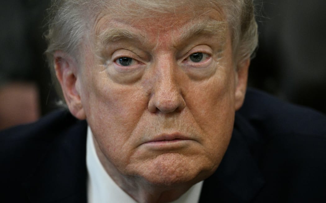 US President Donald Trump speaks after signing an executive order in the Oval Office of the White House in Washington, DC on April 18, 2026. The executive order aims to further US federal medical research and clinical trials for certain psychedelic drugs.certain psychedelic drugs. (Photo by Jim WATSON / AFP)