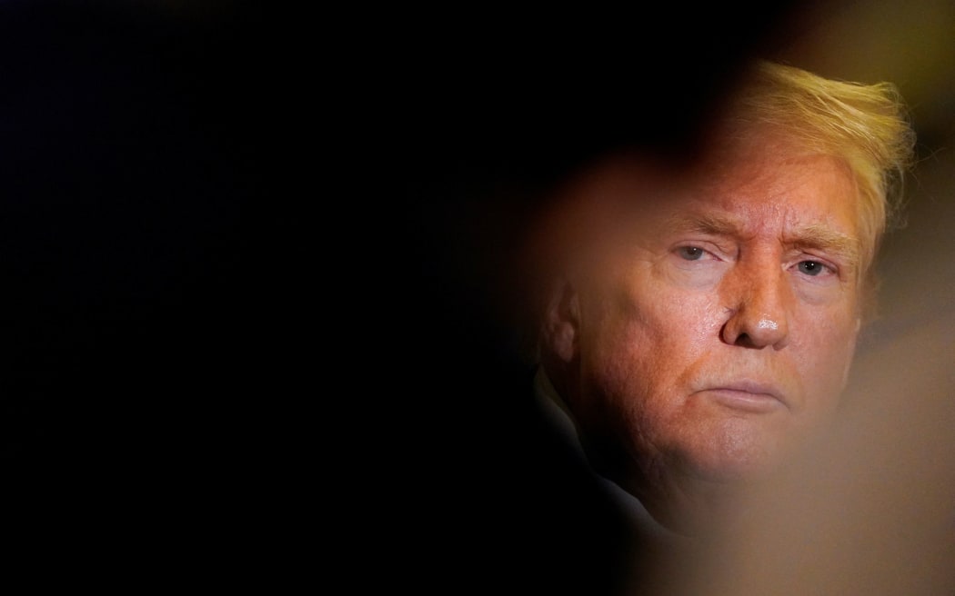 President Donald Trump on Air Force One, on travel from West Palm Beach, Florida, to Joint Base Andrews, Maryland, on February 16.