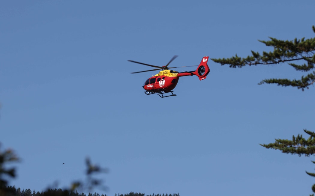 The Life Flight Westpac Rescue Helicopter being used in the search for a crashed helicopter in the  Paekākāriki Hill area on 28 January 2026.