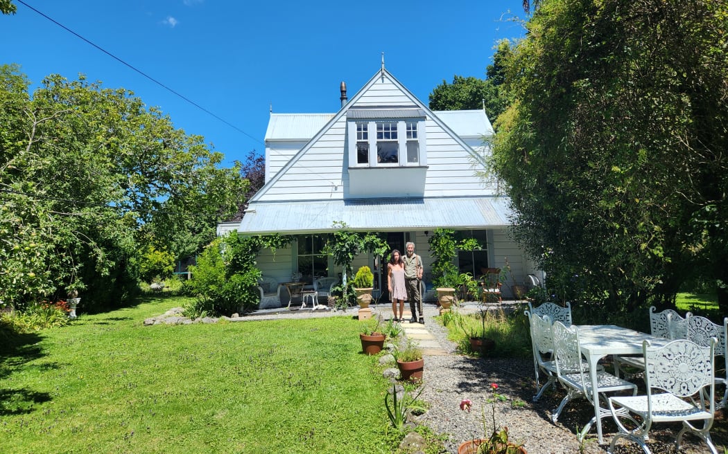 Nicole and William outside their home on the outskirts of Featherston