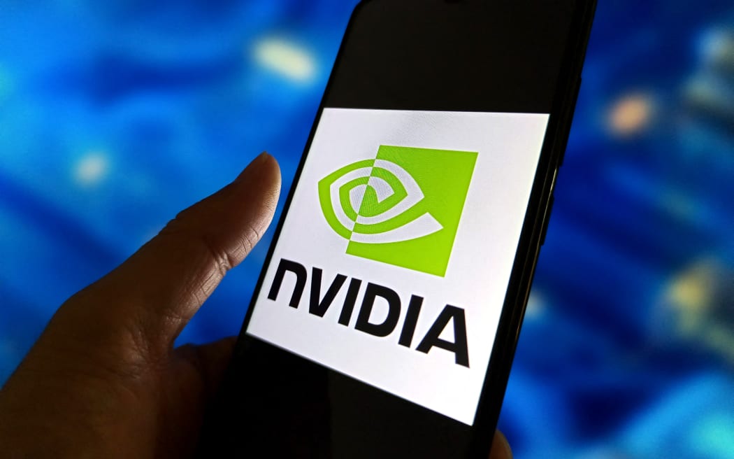 An illustration photo shows NVIDIA logo in a smartphone in Suqian, Jiangsu Province, China on October 29, 2025 .