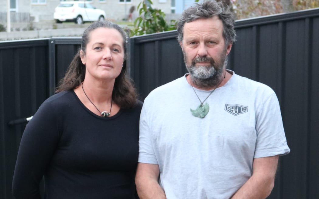 Wednesday Davis' father Paul and stepmother Sarah Hall.