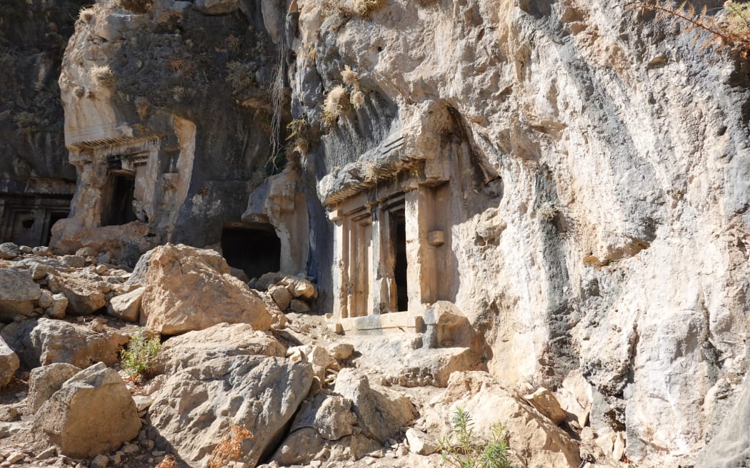 This is an image of a building carved into the side of a cliff in Turkey.