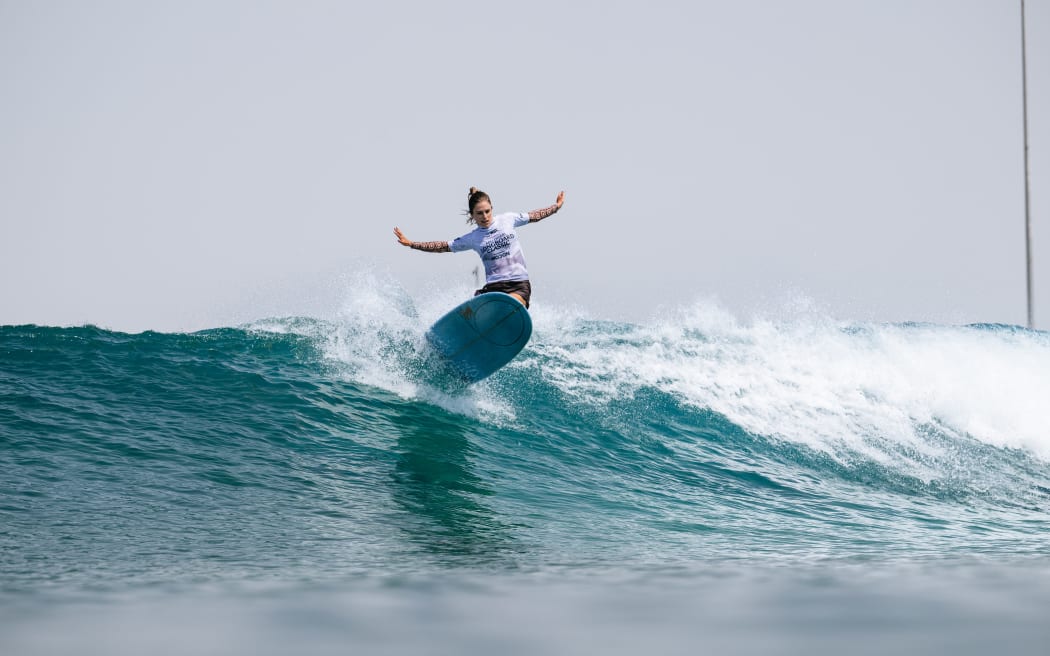 HUDAYRIAT ISLAND, ABU DHABI, UNITED ARAB EMIRATES - SEPTEMBER 28: Emma Perrier of Australia surfs in Heat 3 of the Opening Round at the Abu Dhabi Longboard Classic on September 28, 2024 at Hudayriat Island, Abu Dhabi, United Arab Emirates. (Photo by Beatriz Ryder/World Surf League)