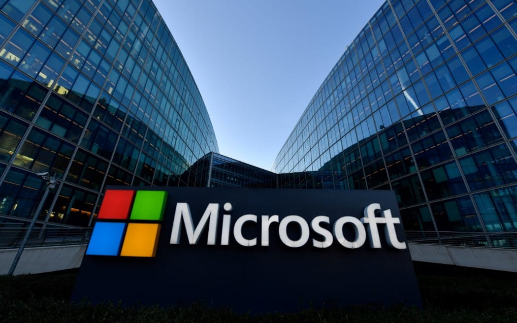 The logo of French headquarters of American multinational technology company Microsoft, is pictured outside on March 6, 2018 in Issy-Les-Moulineaux, a Paris' suburb.