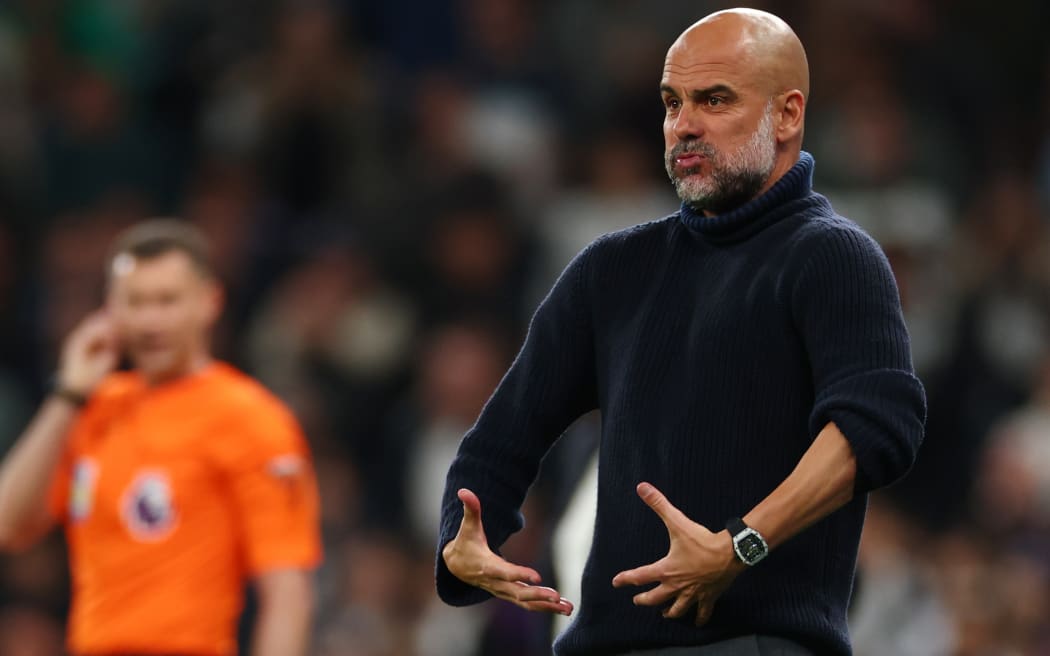 An animated Manchester City Manager Pep Guardiola.