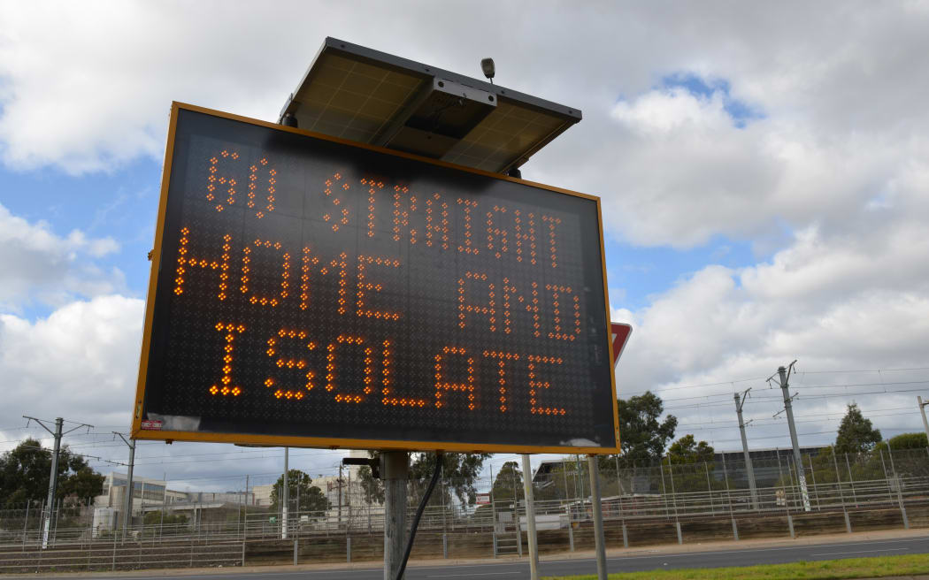 \A warning sign is seen as part of Covid-19 precautions as Australia's Victoria state reimposes lockdown.