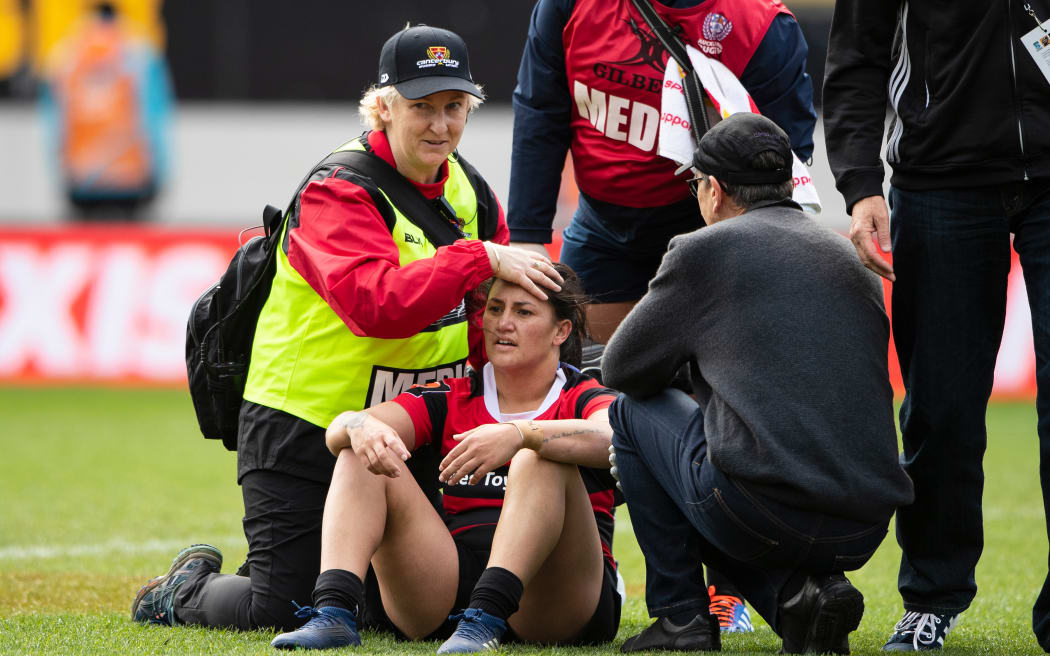 Canterbury winger Te Rauoriwa Gapper injured after a hard tackle, which forced her from the field, during the Farah Palmer Cup match between Auckland Storm and Canterbury in 2019.