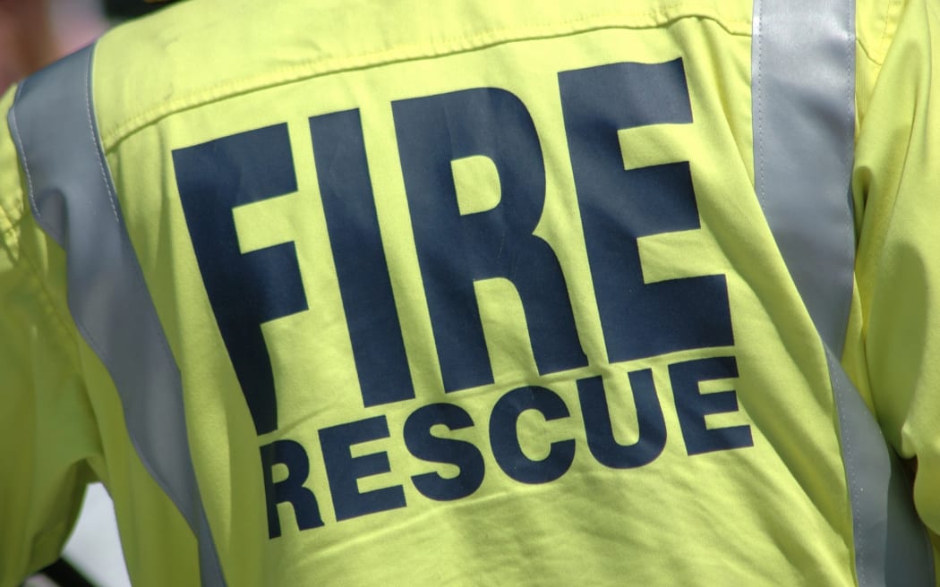 14915103 - fireman wearing a fire rescue jacket