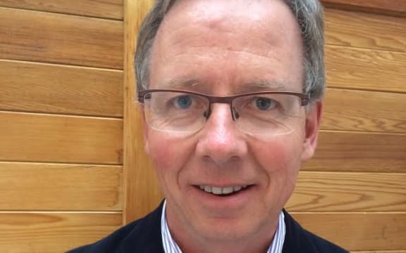 A portrait of economist Michael Redell.