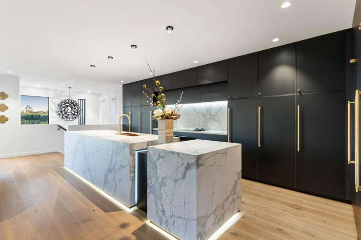 The new owner of this five-bedroom home at 12 Grand Ridge Drive, in Auckland's Flat Bush, could also be taking possession of a 2021 Lamborghini Huracan EVO RWD. Photo / Supplied