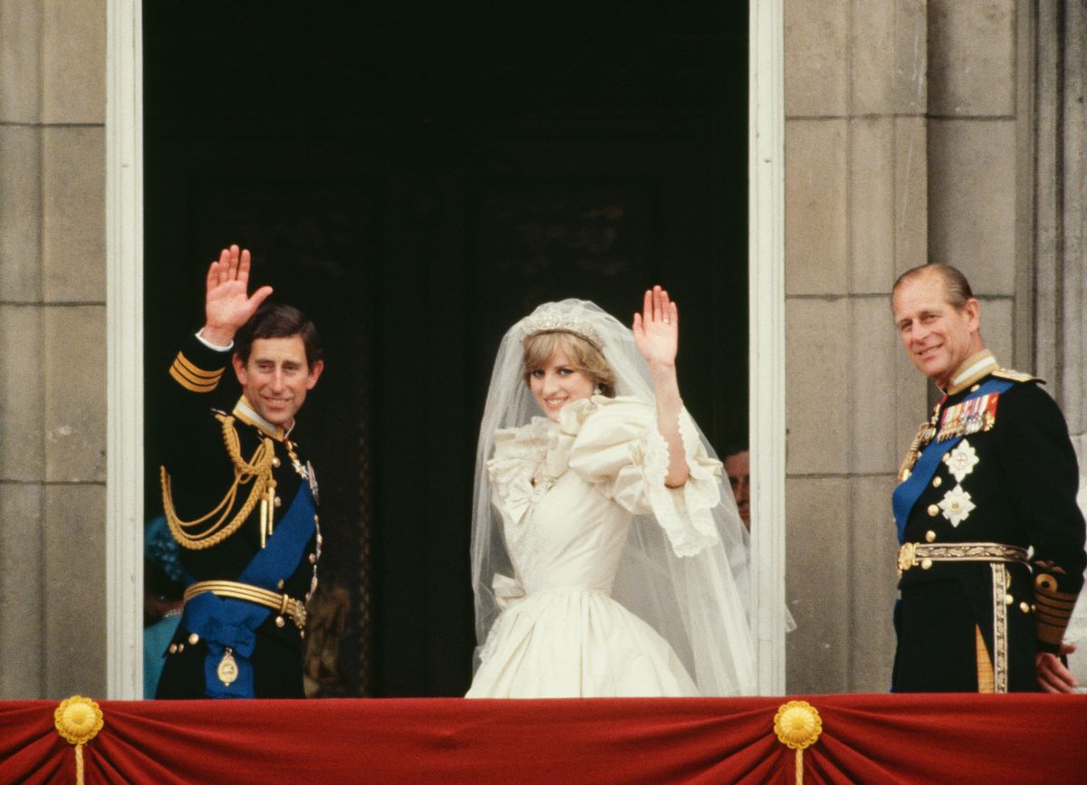 Prince Charles And Princess Diana Waving From The Balcony Of Buckingham Palace.