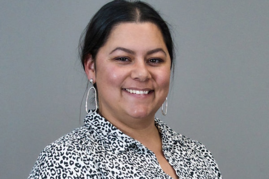 A woman posing for a photo
