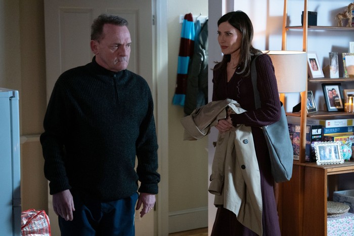 559310,TITLE:Eastenders Bea stands sheepishly beside Billy in a scene from EastEnders