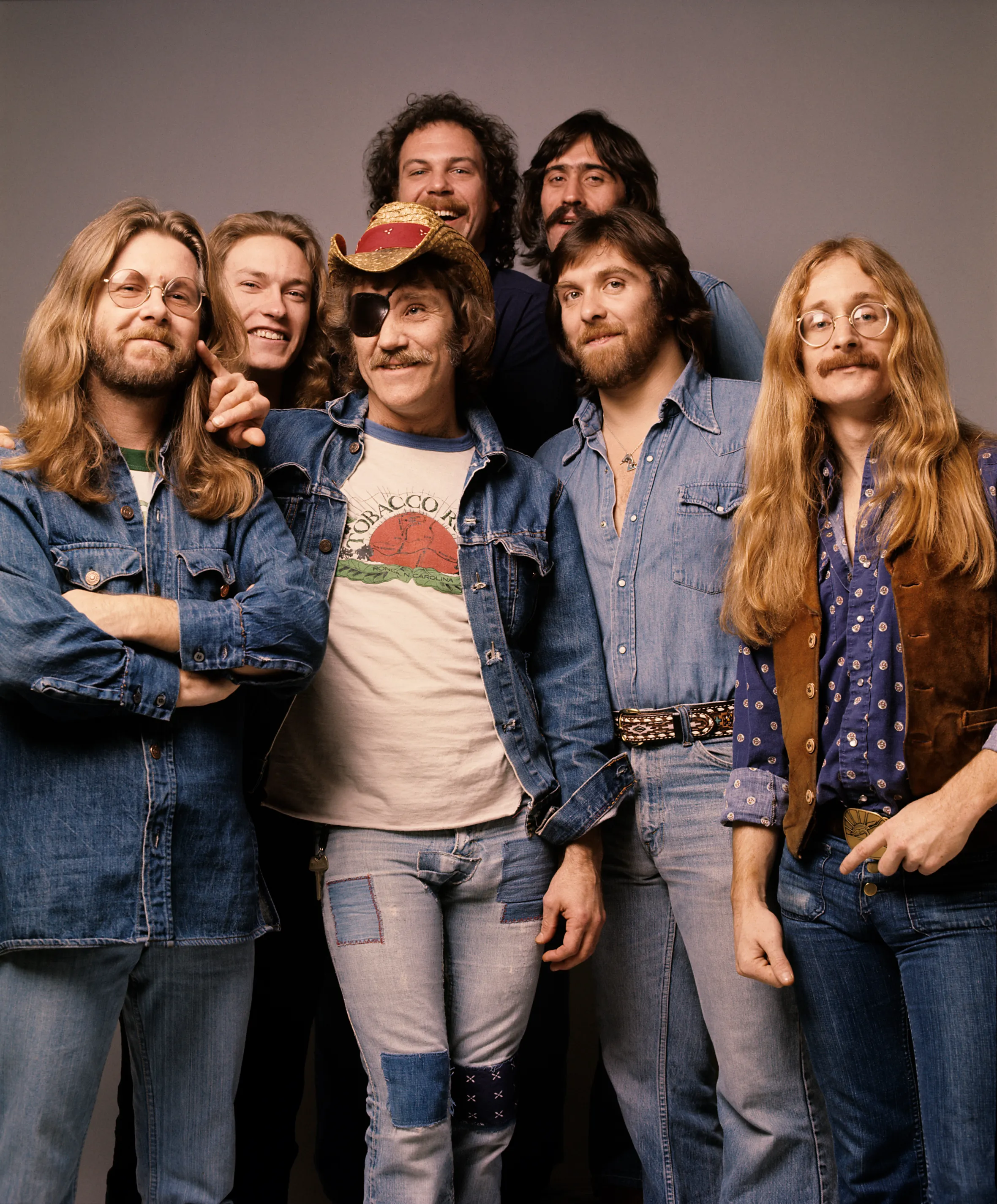 Seven members of Doctor Hook band pose for a photo.