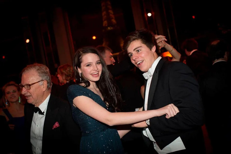 Isabel Beatty dances with a male partner at the 22nd Debutantes Ball at Palais de Chaillot in 2014.