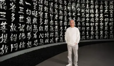 Hiroshi Sugimoto with his work Brush Impression, Heart Sutra (2023)
