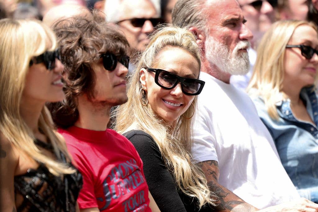 Proud mom Tish at the ceremony with Miley and Maxx
