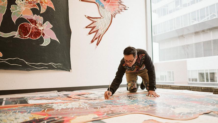 Richie Morales working in his studio