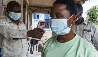American confirmed with Ebola as US screens airports and suspends visas